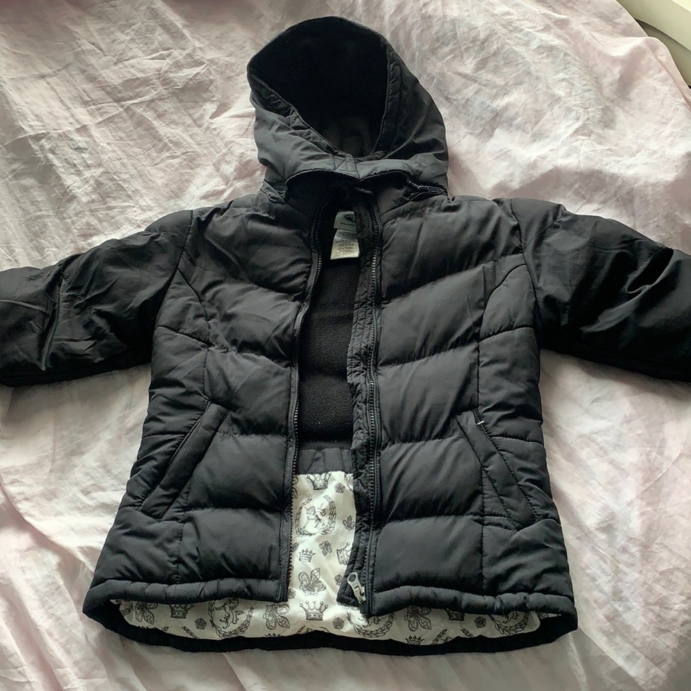 Girl’s black puffer jacket